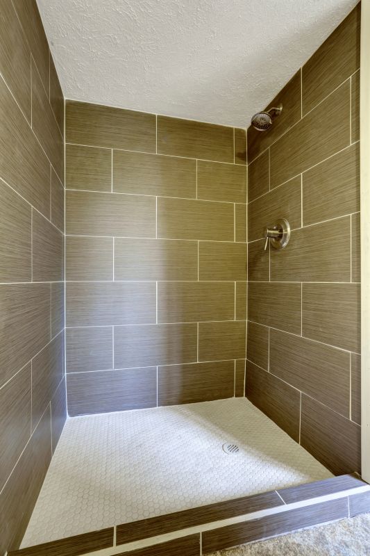 Modern Shower with Geometric Tile Patterns
